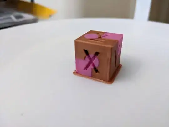 A dual-colour cube showing good X/Y alignment