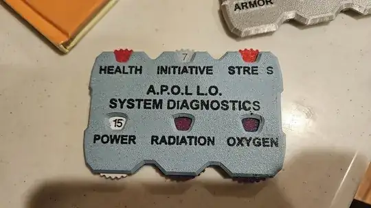 Photo of a printed 3D model with a gray body and embedded black text. There are parts of the lettering missing.