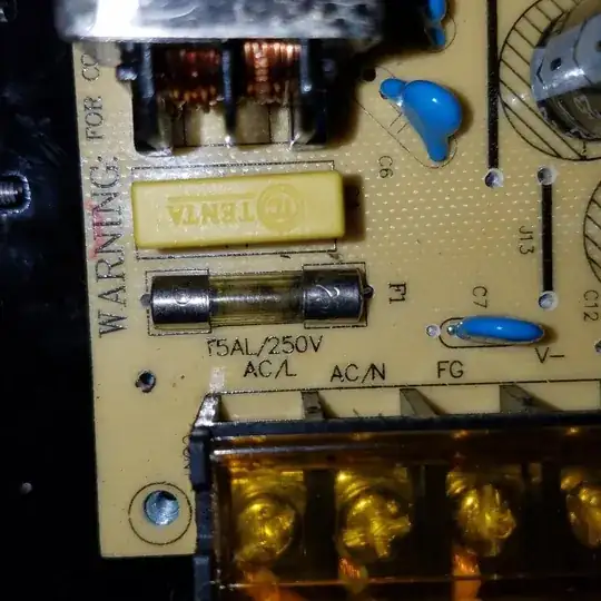 PSU, cover removed showing fuse