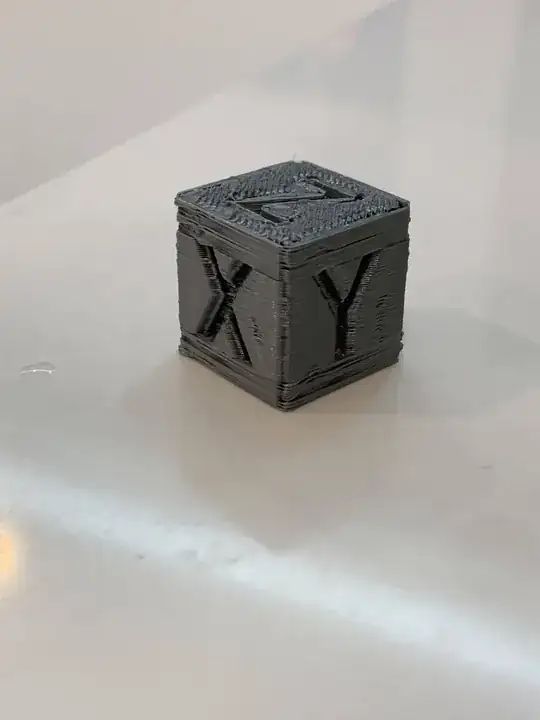 Calibration cube printed after tensioning the belts calibration cube